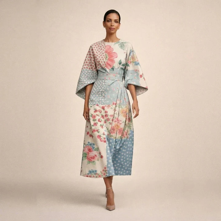 CLEMENTINE | Florale Midi met sculptuur taille en luchtige elegantie