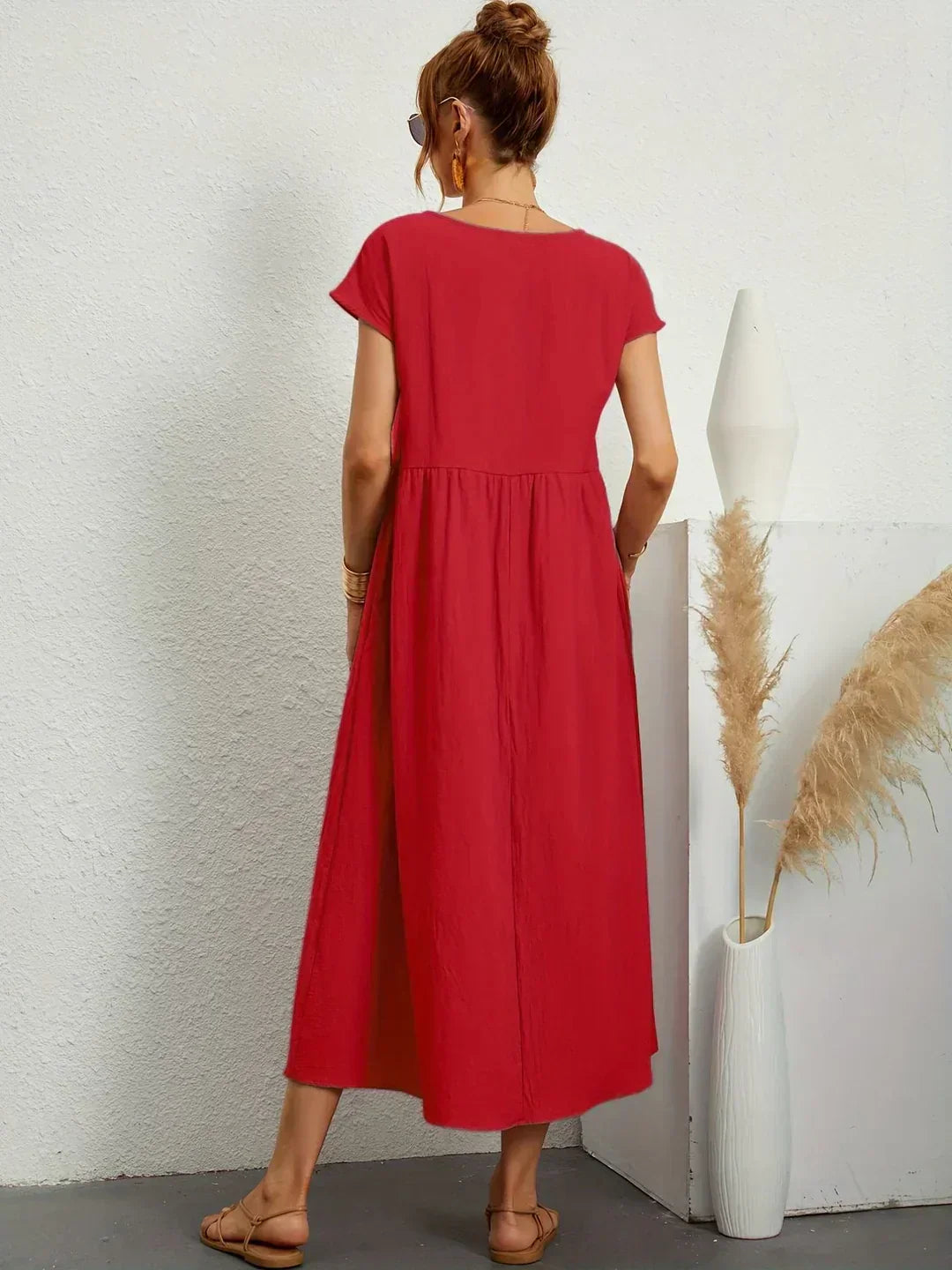 HEIKE | VLOEIEND MIDIKLEID VAN TIJDLOZE ELEGANTIE