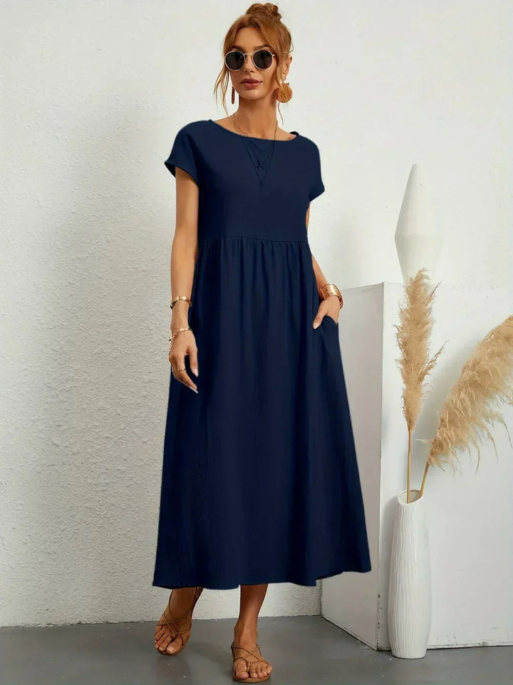 HEIKE | VLOEIEND MIDIKLEID VAN TIJDLOZE ELEGANTIE