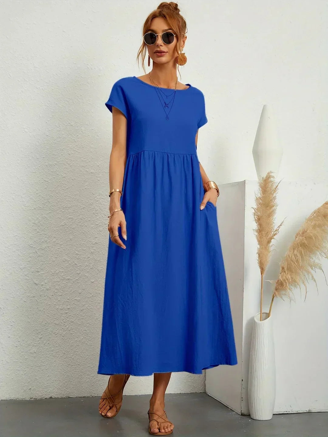 HEIKE | VLOEIEND MIDIKLEID VAN TIJDLOZE ELEGANTIE