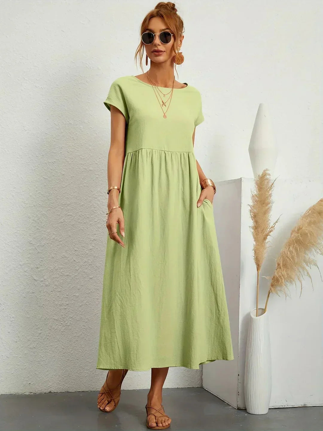 HEIKE | VLOEIEND MIDIKLEID VAN TIJDLOZE ELEGANTIE