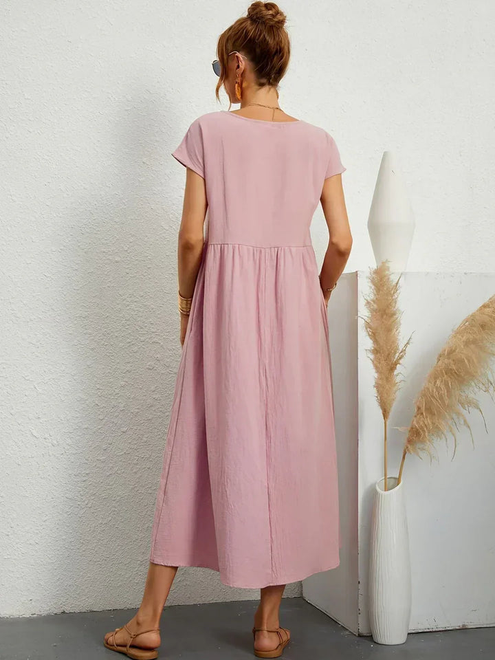 HEIKE | VLOEIEND MIDIKLEID VAN TIJDLOZE ELEGANTIE