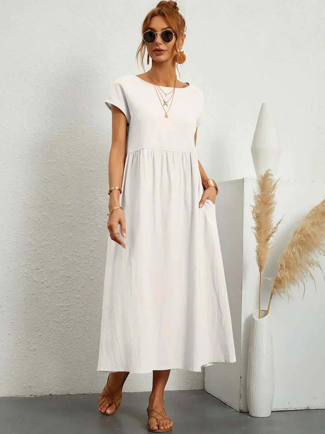 HEIKE | VLOEIEND MIDIKLEID VAN TIJDLOZE ELEGANTIE