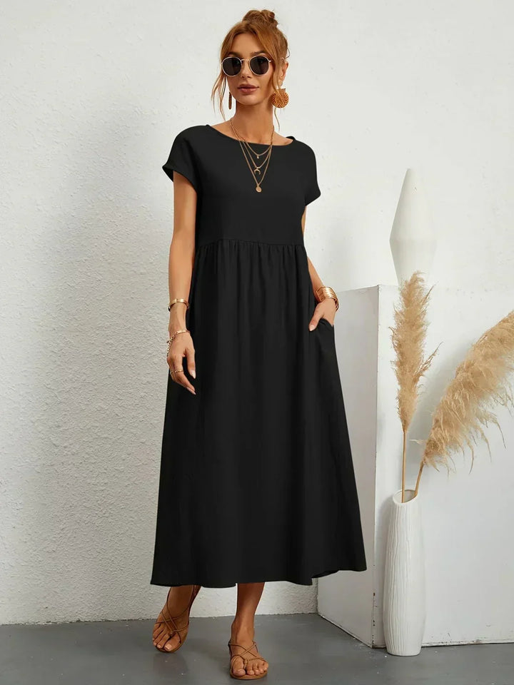 HEIKE | VLOEIEND MIDIKLEID VAN TIJDLOZE ELEGANTIE